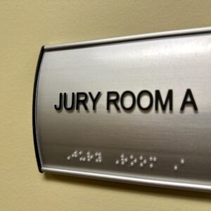 ADA compliant room sign with braille for jury room identification