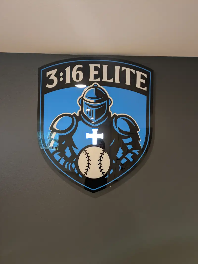 Custom acrylic lobby sign with dimensional logo installation in Van Alstyne, TX by Vantage Point Signs