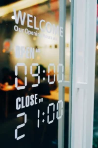 clean frosted vinyl logo and business hours decal.